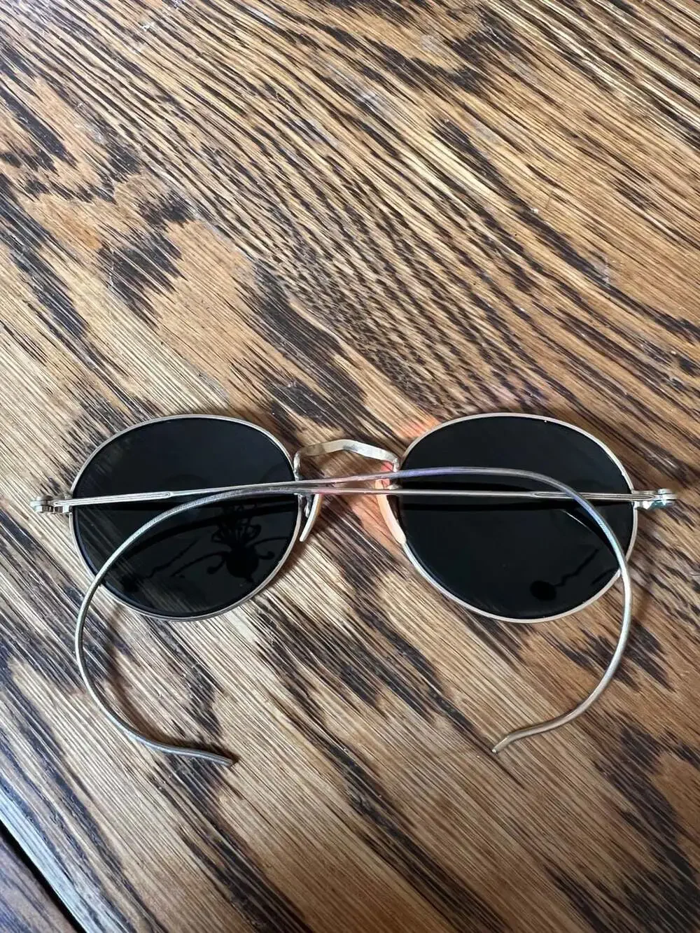 AO 
American Optical vintage round